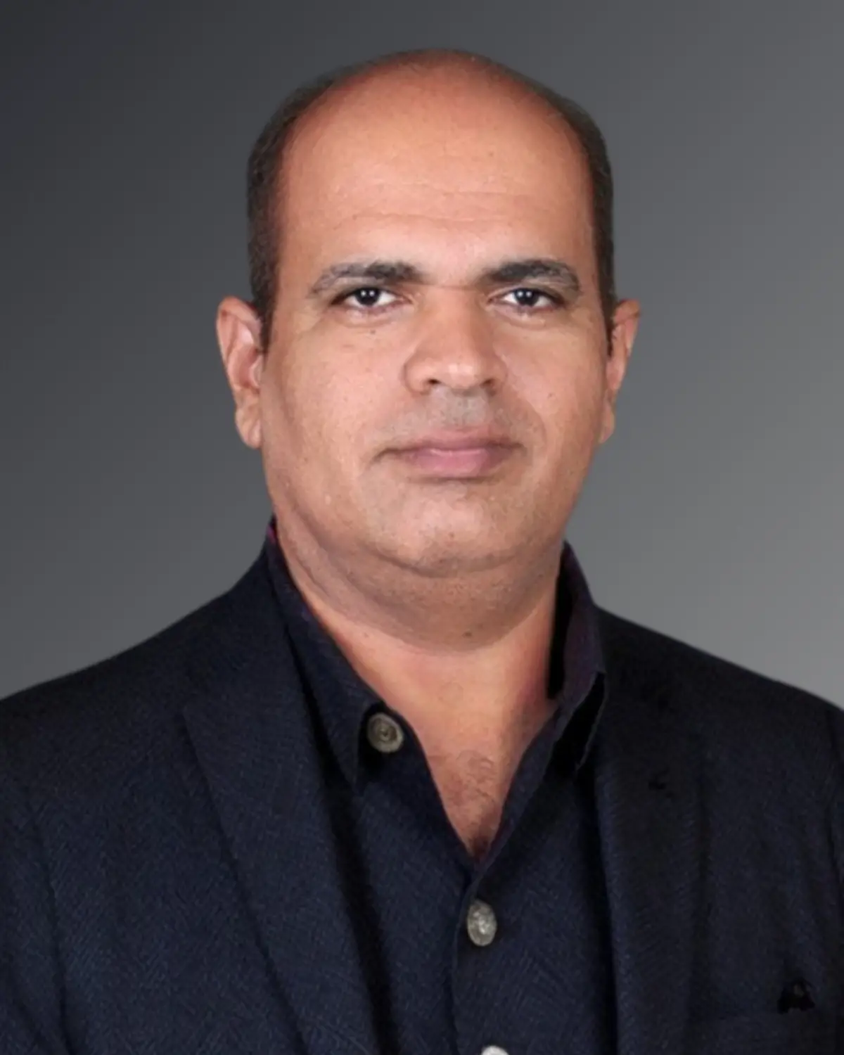 Harminder Singh, regulated Canadian immigration consultant (RCIC) in Calgary specializing in PR, work permits, and visa applications